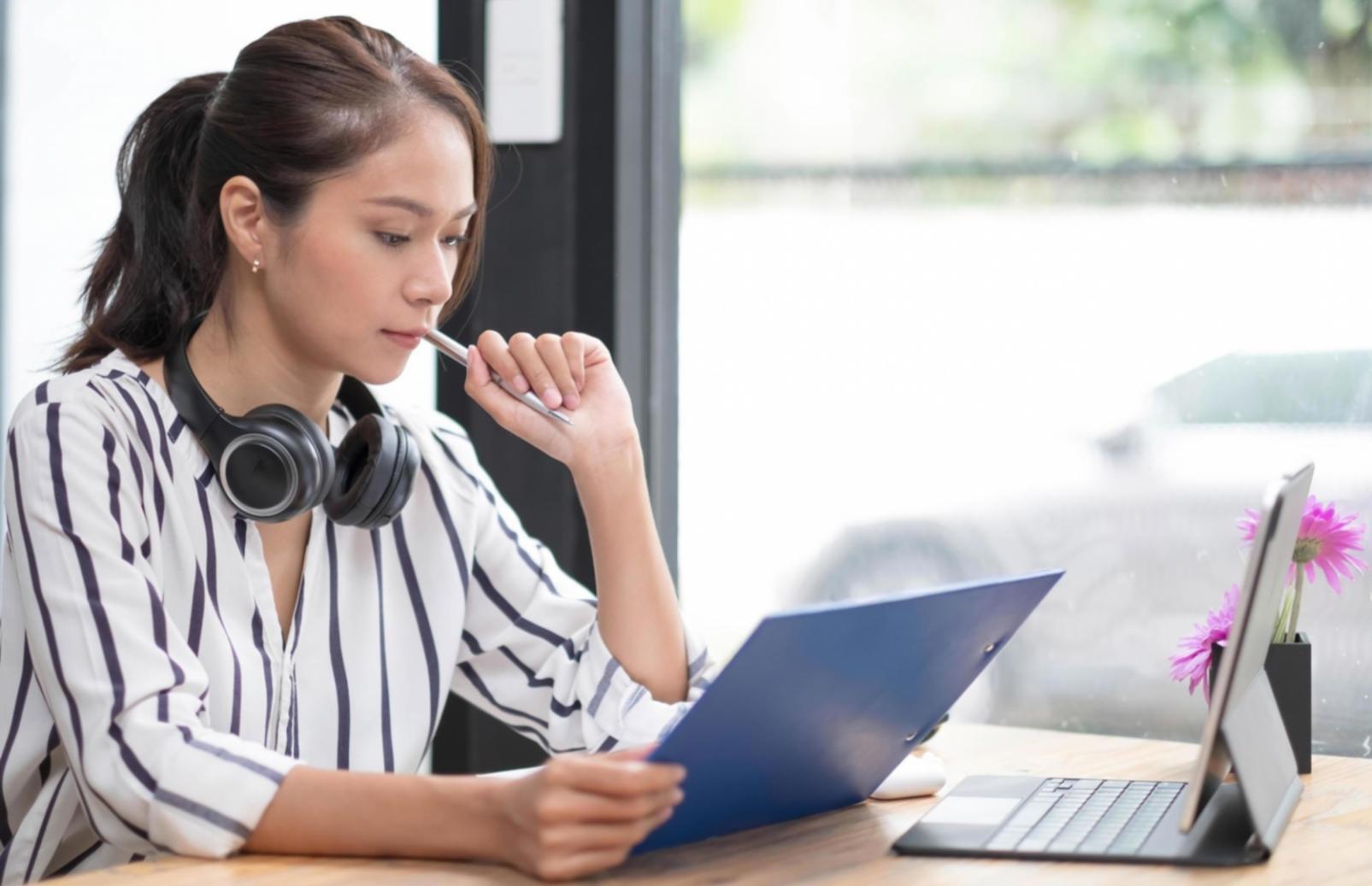 Financial planning workspace with charts and documents